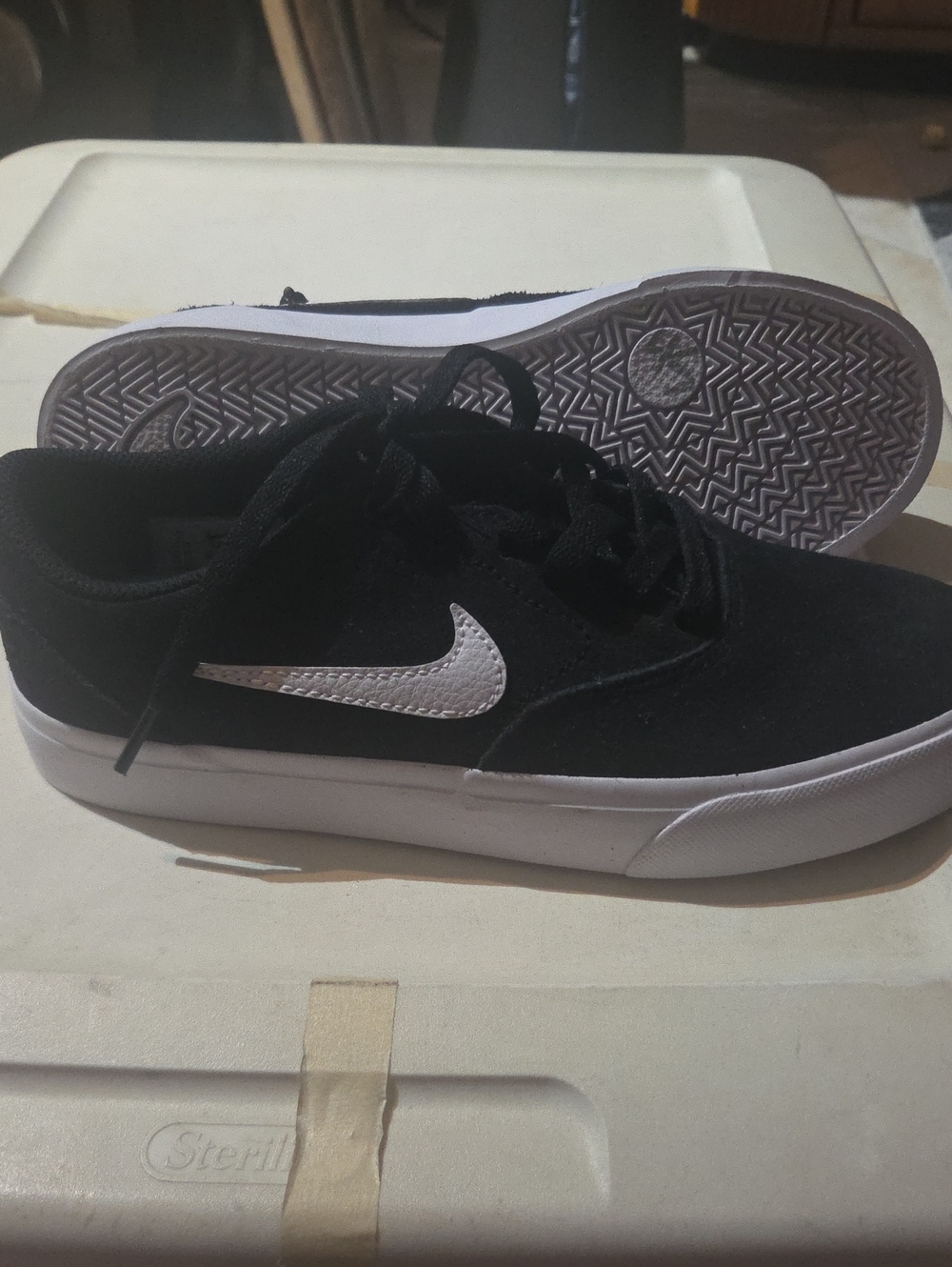 Nike Charge Suede Black Low-Top Sneakers with White Swoosh